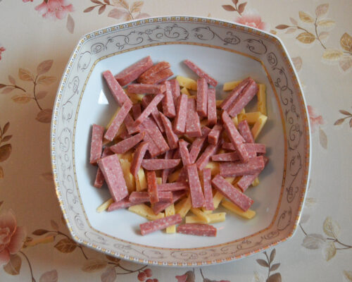 Cut the salami into sticks