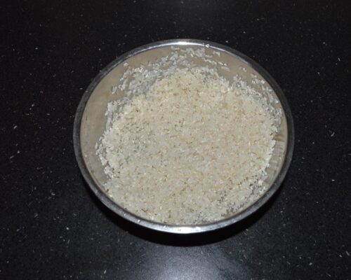 Wash the rice in several changes of water