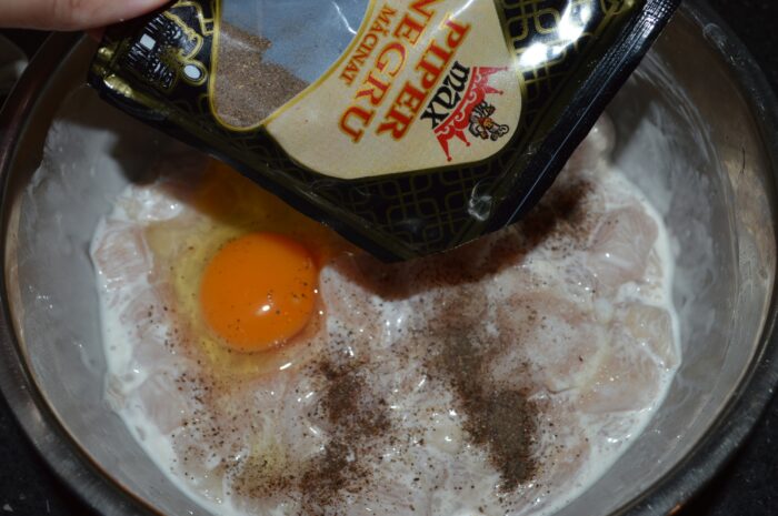 Sprinkle ground black pepper