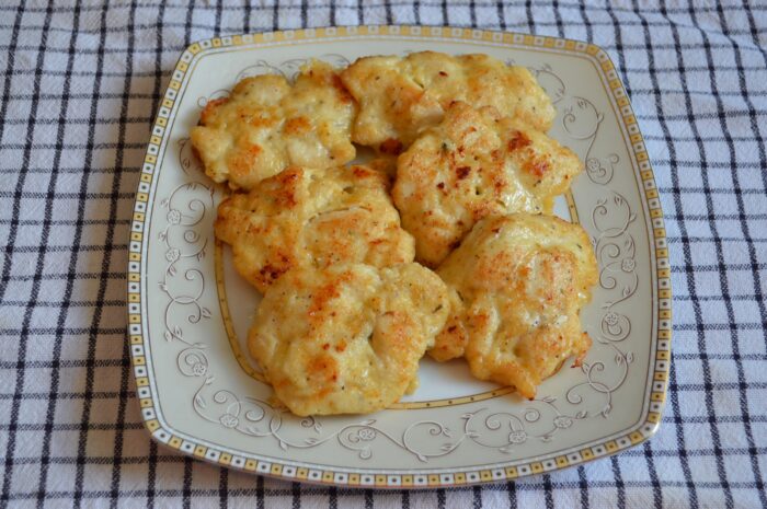 Golden chicken breast patty with crispy edges