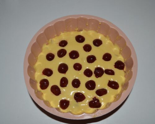 Arrange the cherries on top of the mixture