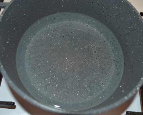 In a pot boil water over high heat