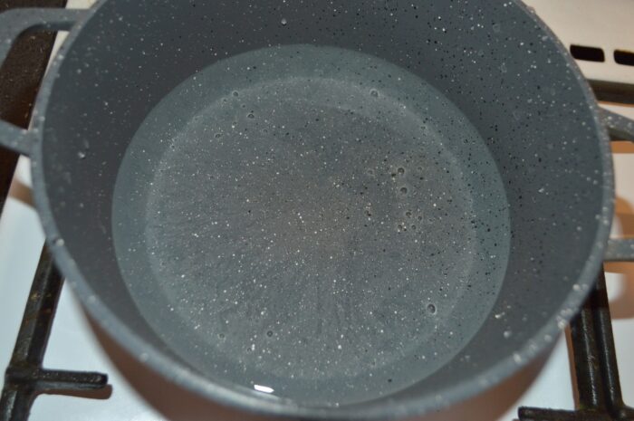 In a pot boil water over high heat