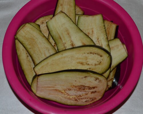 Put the eggplant slices in a bowl