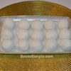 Cottage cheese balls rolled in coconut flakes