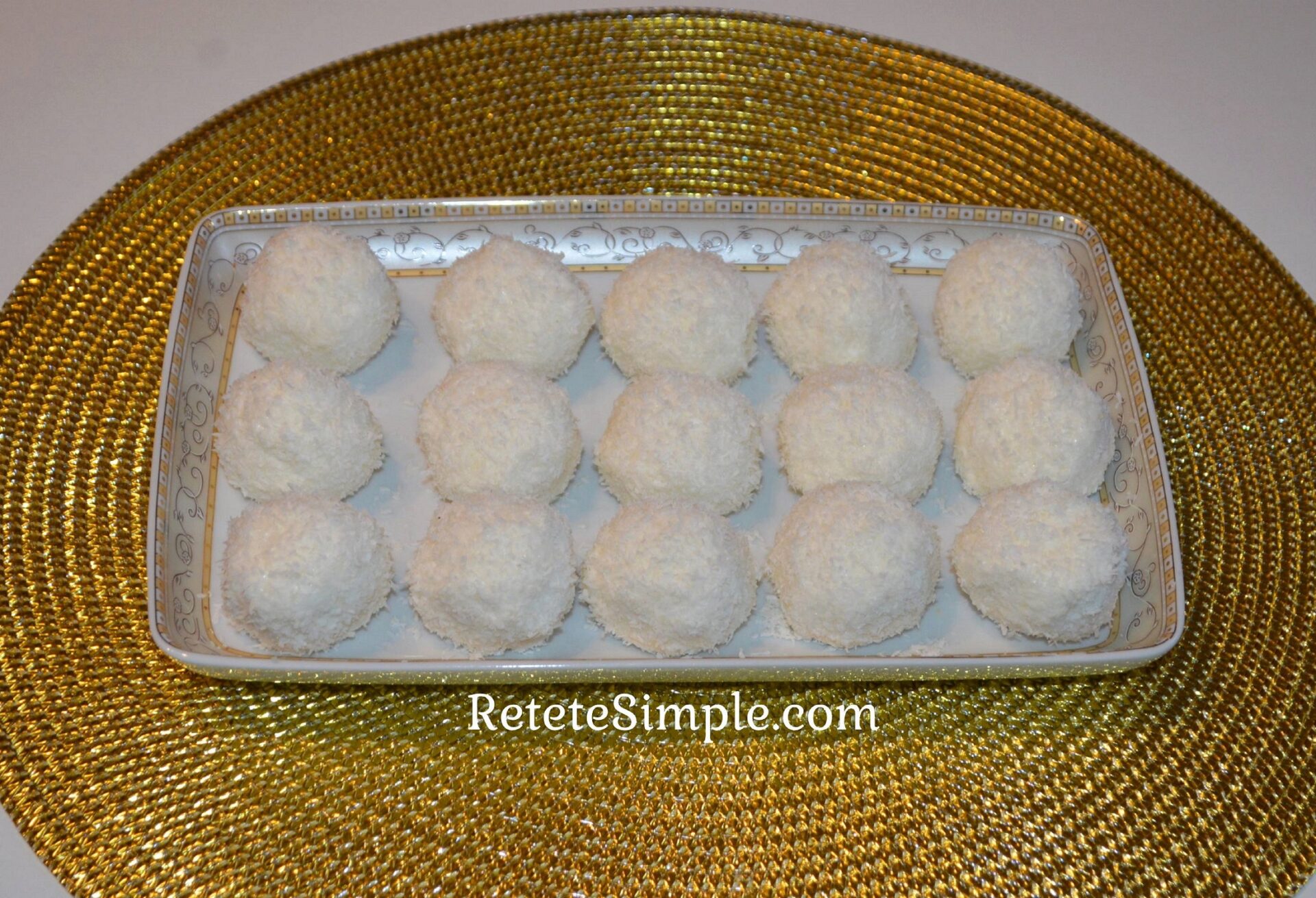 Cottage cheese balls rolled in coconut flakes