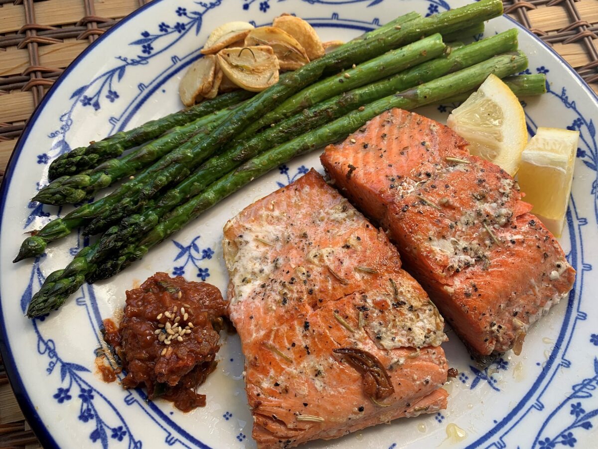 Healthy meal plate: salmon, tomato-infused rice and chickpea salad