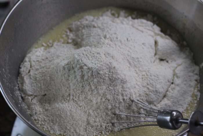 Add the baking powder and flour