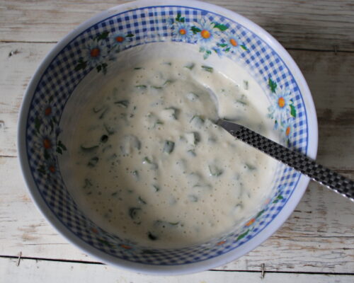 Add the herbs to the dough