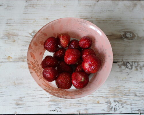 Remove the stems from the strawberries