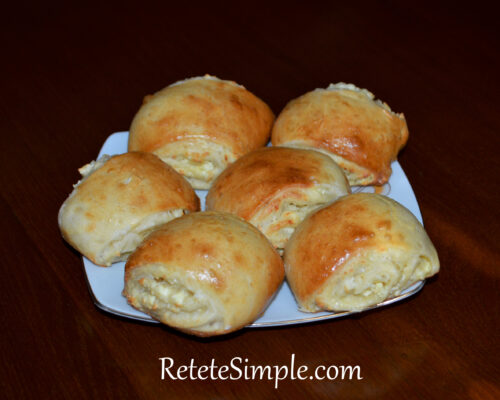 Stack of cheese turnovers served on a plate