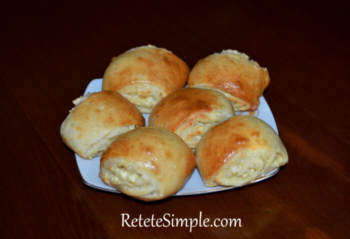 Stack of cheese turnovers served on a plate