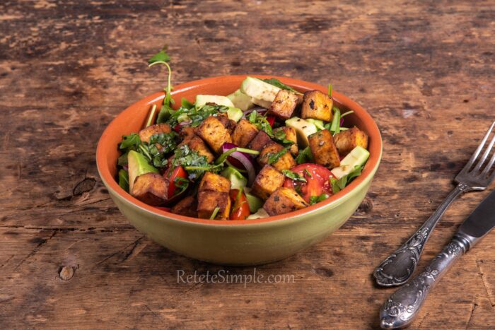 Crispy tofu and fresh vegetables in a soy-balsamic dressed bowl
