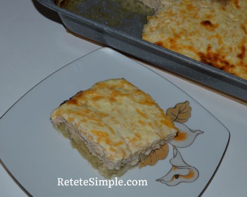 Golden top of oven casserole with potatoes, chicken and cheese