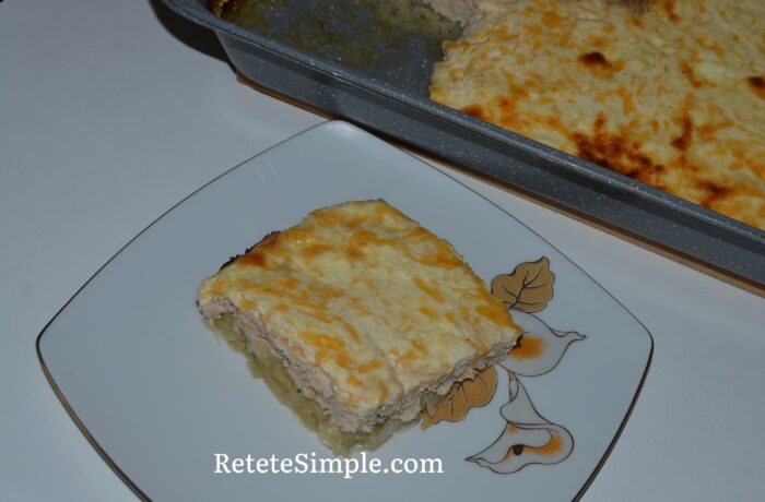 Golden top of oven casserole with potatoes, chicken and cheese
