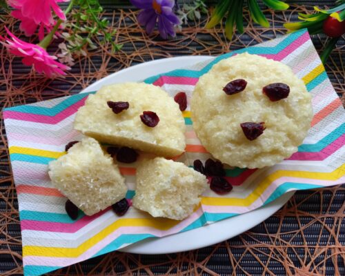 Side view of muffin half-cut showing interior