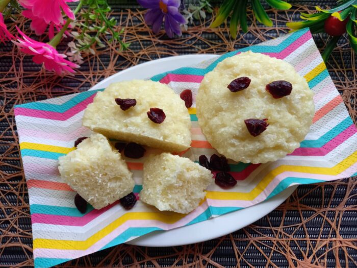 Side view of muffin half-cut showing interior