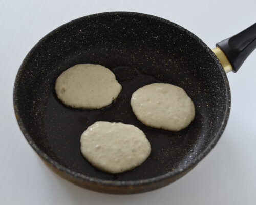 place the prepared mixture in the heated pan