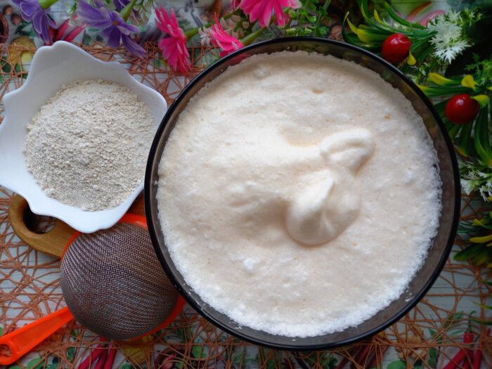 sift the oat flour and gradually pour it