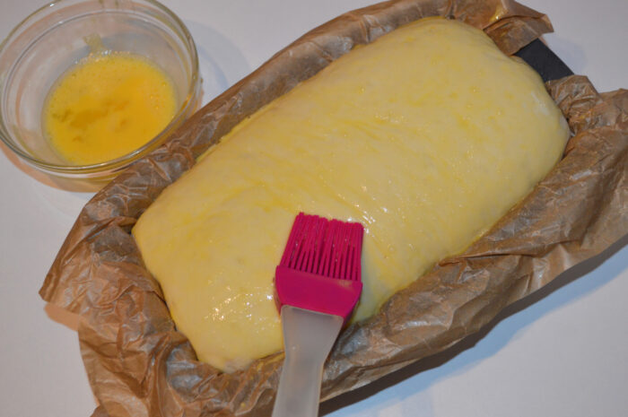 use a pastry brush to grease the bread