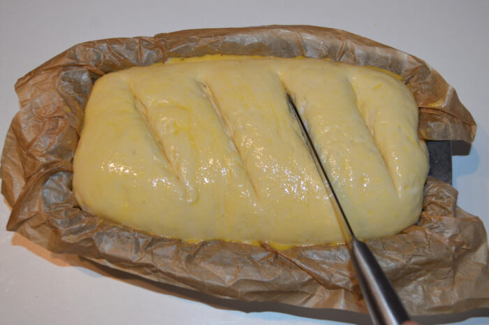 An important step in baking bread is scoring it with a knife