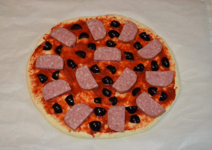 Arrange the finely chopped olives