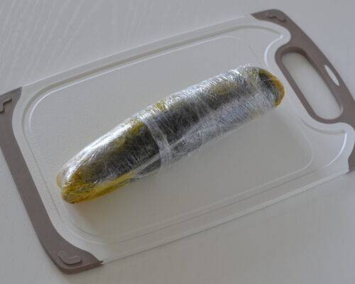 roll up the mackerel fillet and wrap