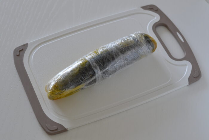 roll up the mackerel fillet and wrap