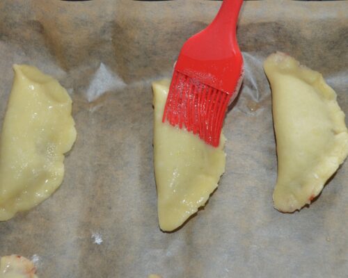 grease each crescent with a pastry brush