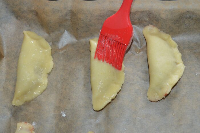 grease each crescent with a pastry brush