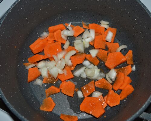 Chop the onion and carrot and fry