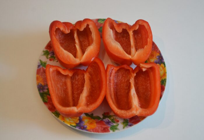 Wash the bell peppers and cut