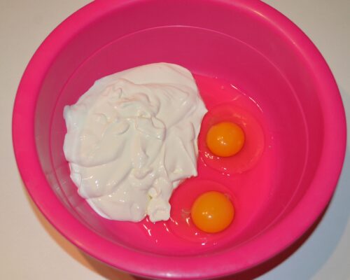 Add the eggs and sour cream