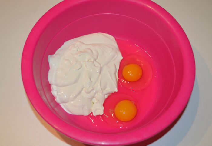 Add the eggs and sour cream