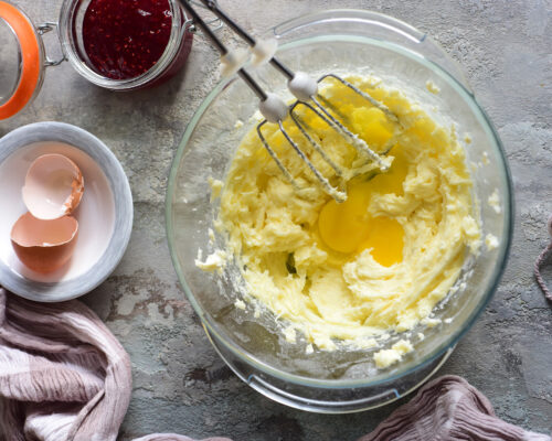 Lightly beat the egg