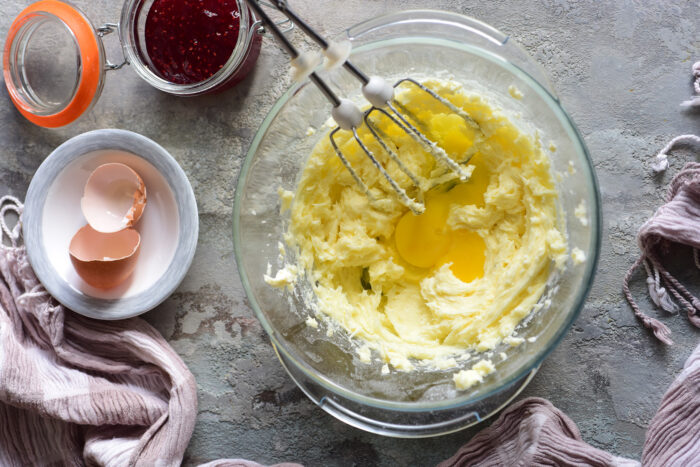 Lightly beat the egg