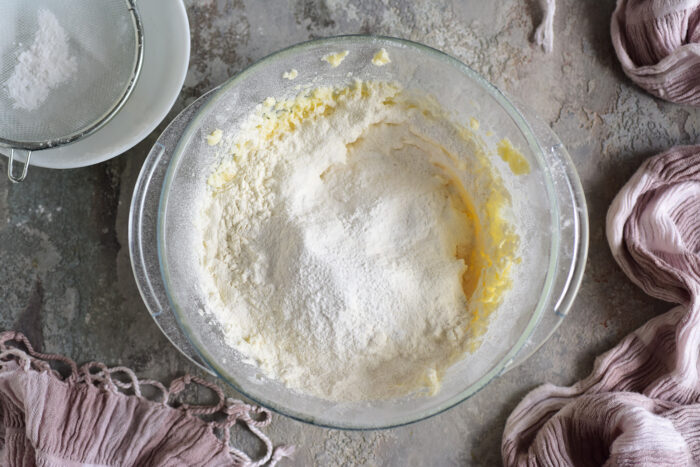 Sift all the flour into the mixture