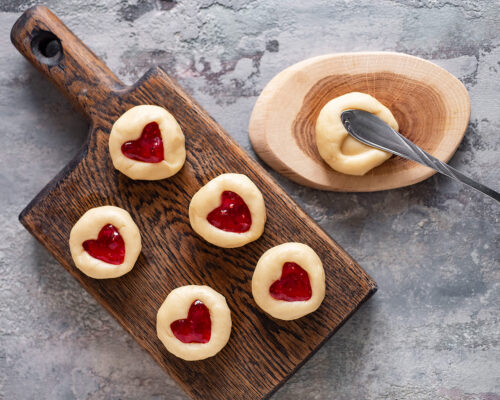 flatten it slightly with your fingers into a thick cookie
