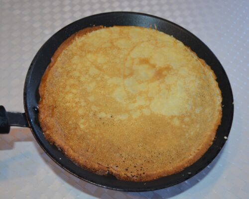 Then flip the crepe over and cook