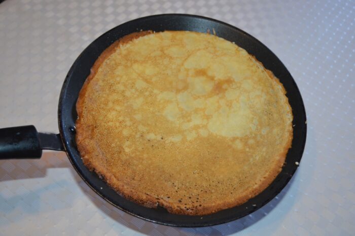 Then flip the crepe over and cook