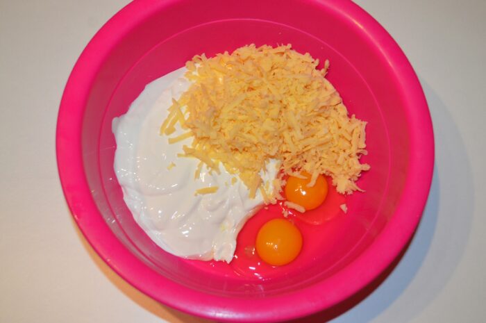 Add the grated cheese