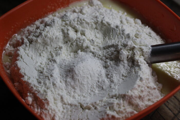 Add the baking powder and flour