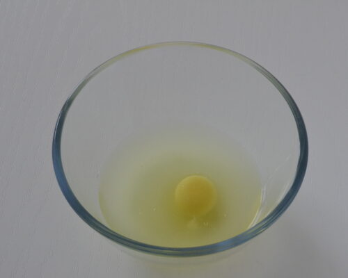 Add the egg to the warm whey