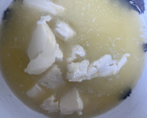 melt the butter in a double boiler