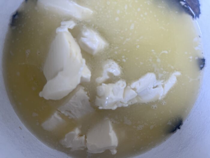 melt the butter in a double boiler