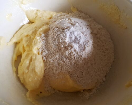 add the sifted flour