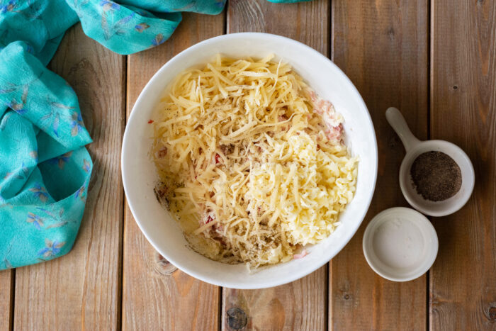 Add the grated cheese