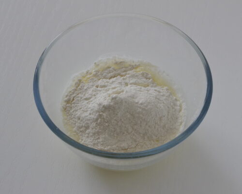 Add the sifted flour