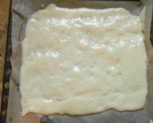 Pour the batter onto the baking tray