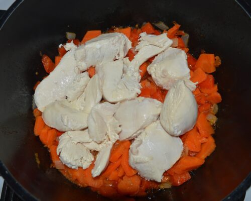 add the chicken breast to the pot